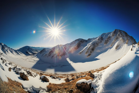 Beautiful winter mountains landscape with snow covered peaks and blue sky.の写真素材