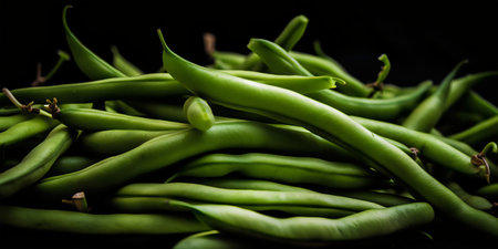 Green beans on a black background. Close-up. Selective focus.の写真素材