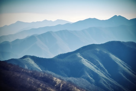 Beautiful mountain landscape with blue sky and clouds. Vintage-style.の写真素材
