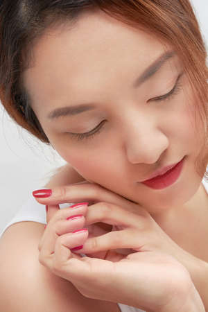 Beauty Asian woman close up face white background