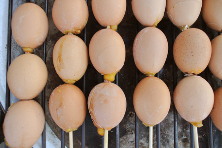Grilled eggs at street food in Thailandの写真素材