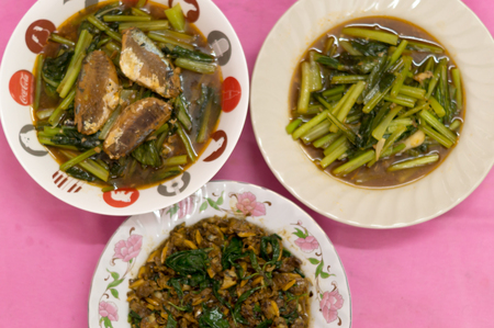 Thai and Chinese food: fried clam, canned fish and Chinese mustard greenの写真素材