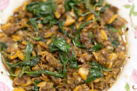 Thai and Chinese food: fried clam, canned fish and Chinese mustard green
