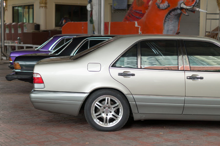 Luxurious cars parked at temple areaの写真素材