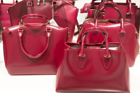 Red beautiful handbags for womenの写真素材