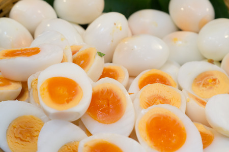 Peeled boiled eggs in both whole and half shape, healthy boiled eggsの写真素材