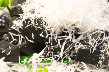 black coconut sweet pudding with shredded coconut, delicious Thai desserts, backgroundの写真素材