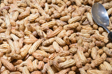 Boiled big peanut background with ladle on sale in supermarket, healthy big peanut