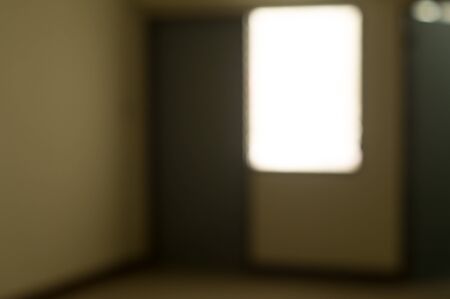 Blurred dark old room background is frightful.