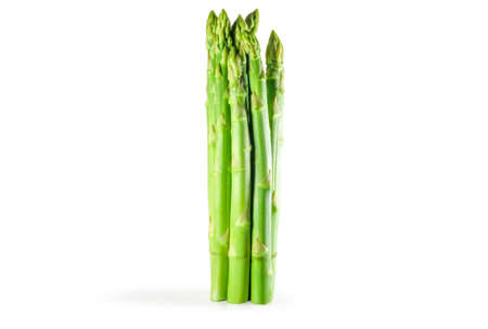 A bunch of fresh asparagus is isolated on white background.の写真素材