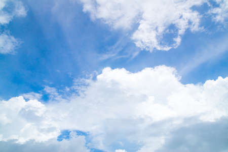 Beautiful blue sky with white cloud and clear light is under shining from the sun.の写真素材