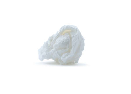 Single screwed or crumpled tissue paper after use is isolated on white background .の写真素材