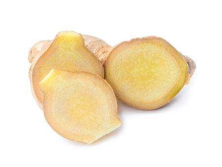Fresh ginger with slices is isolated on white background