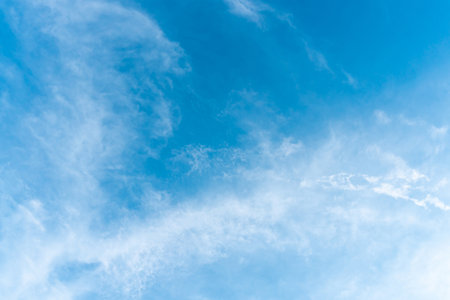 Beautiful blue sky with strange shape of clouds in the morning or evening was taken at the sea for natural background or textureの写真素材