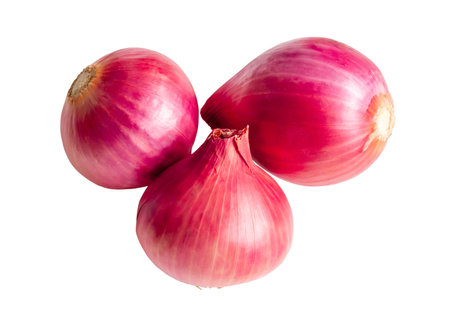 Top view of fresh red onions in stack are isolated on white background with clipping path.の写真素材
