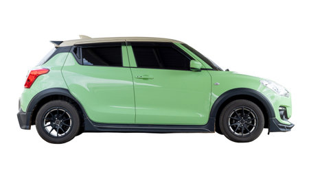 Single lovely small light green car or mini car is isolated on white background with clipping path.の写真素材