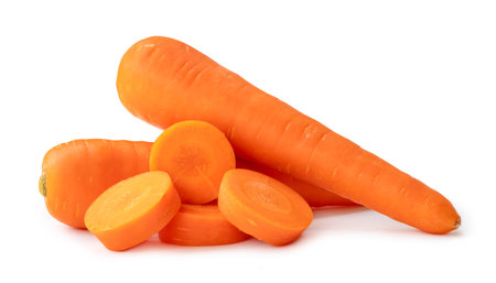 Two fresh orange carrots with slices in stack are isolated on white background with clipping path. Close up of healthy vegetable rootの写真素材