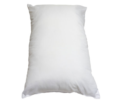 White pillow in hotel or resort room is isolated on white background with clipping path. Concept of comfortable and happy sleep in daily lifeの写真素材
