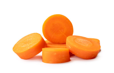 Fresh beautiful carrot slices are isolated on white background witch clipping path. Front view.の写真素材