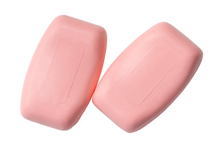 Top view of two dry pink soap bars are isolated on white background with clipping path.
