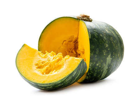 Fresh kabocha or green japanese pumpkin with slice is isolated on white backgroundの写真素材