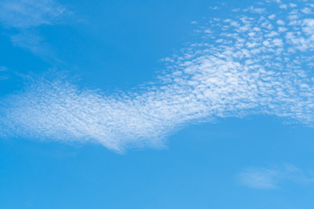 Beautiful blue sky with strange shape of clouds in the morning or evening was taken at the sea for natural background or textureの写真素材