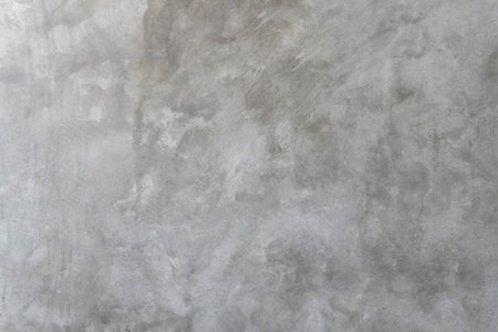 Old dirty grey concrete background texture is used in decorative art work. Gray concrete wall texture with strange pattern and stripesの写真素材