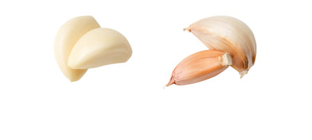 Top view set of peeled garlic cloves or slices is isolated on white background with clipping path.の写真素材