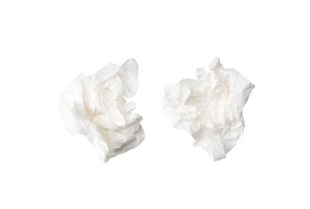 Top view set of screwed or crumpled tissue paper or napkin in strange shape after use in toilet or restroom is isolated on white background with clipping path.の写真素材
