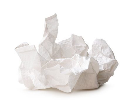 Front view of crumpled tissue paper ball after use in toilet or restroom is isolated on white background with clipping path.の写真素材