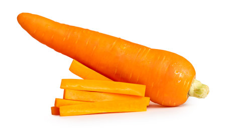 Side view of orange carrot with slices in stick shape in stack is isolated on white background with clipping path.の写真素材