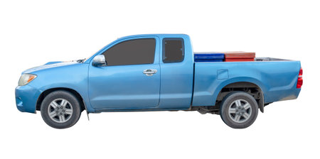 Side view of blue pickup truck is isolated on white background with clipping path.の写真素材