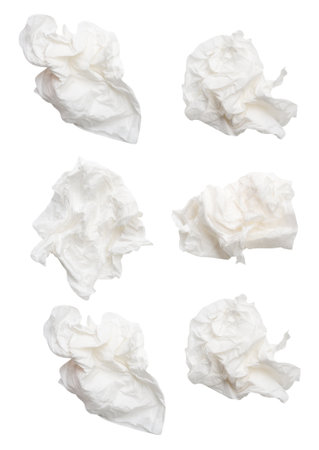Top view set of screwed or crumpled white tissue paper ball is isolated on white background with clipping path.の写真素材