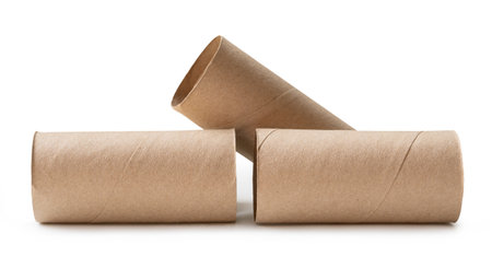 Side view of tissue paper cores or toilet paper tubes in stack after used out in toilet or restroom is isolated on white background with clipping path.の写真素材
