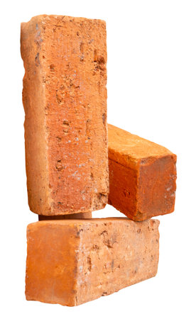 Side view of three old red or orange bricks in stack is isolated on white background with clipping path.の写真素材