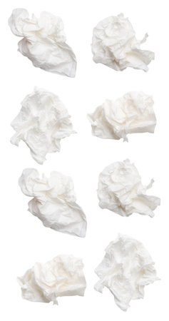 Top view set of screwed or crumpled white tissue paper balls is isolated on white background with clipping path.の写真素材