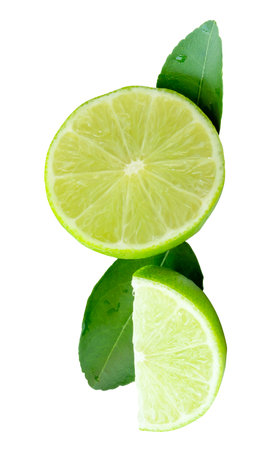 Top view of fresh green lemon fruit in half and quarter or piece with green leaves in stack is isolated on white background with clipping path.の写真素材
