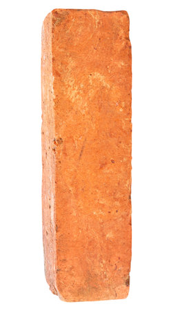 Single old red or orange brick is isolated on white background. with clipping path.の写真素材