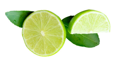 Top view of fresh green lemon fruit in half and quarter or piece with green leaves in stack is isolated on white background with clipping path.の写真素材