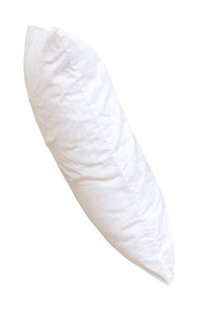 White pillow without case after guest's use in hotel or resort room is isolated on white background with clipping path, Concept of comfortable and happy sleep in daily lifeの写真素材