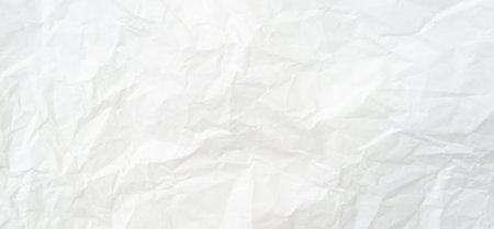 Top view and full frame of wrinkled or crumpled white paper texture is used as crumpled white paper background texture in decorative art work.の写真素材