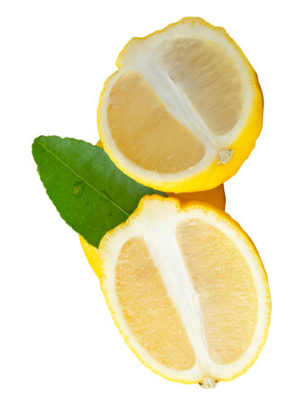 Top view of ripe yellow lemon fruit with two oval or ellipse halves and green leaf in stack is isolated on white background with clipping path.の写真素材