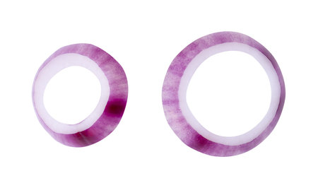 Top view set of fresh red or purple Spanish onion rings or slices is isolated on white background with clipping path.の写真素材