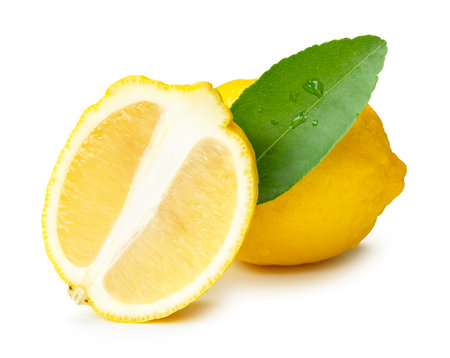 Front view of ripe yellow lemon fruit with half and one green leaf in oval or ellipse in heap is isolated on white background with clipping path.の写真素材