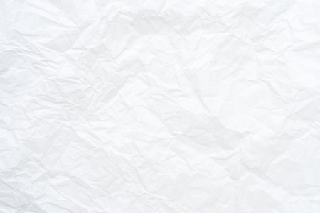Top view and full frame of wrinkled or crumpled white paper texture is used as crumpled white paper background texture in decorative art work.の写真素材