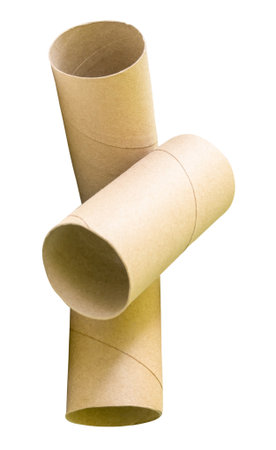 Side view of tissue paper cores or toilet paper tubes in stack is isolated on white background with clipping path.の写真素材