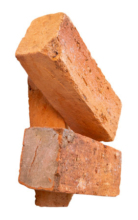 Side view of three cracked old red or orange bricks in stack is isolated on white background with clipping path.の写真素材