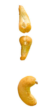 Side view set of three roasted or baked cashew nuts is isolated on white background with clipping path.の写真素材
