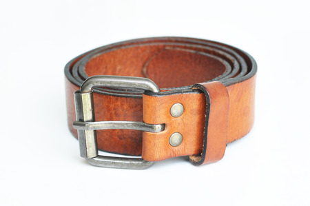 Brown belt in white backgroundの写真素材