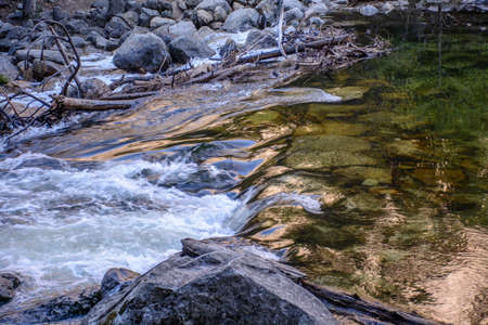 I am glad to take this amazing shot at the amazing Yosemite National Park. The movement of water shows the contrast of quiet and dynamic.の写真素材